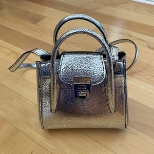 Silver Michael Kors Collection purse
